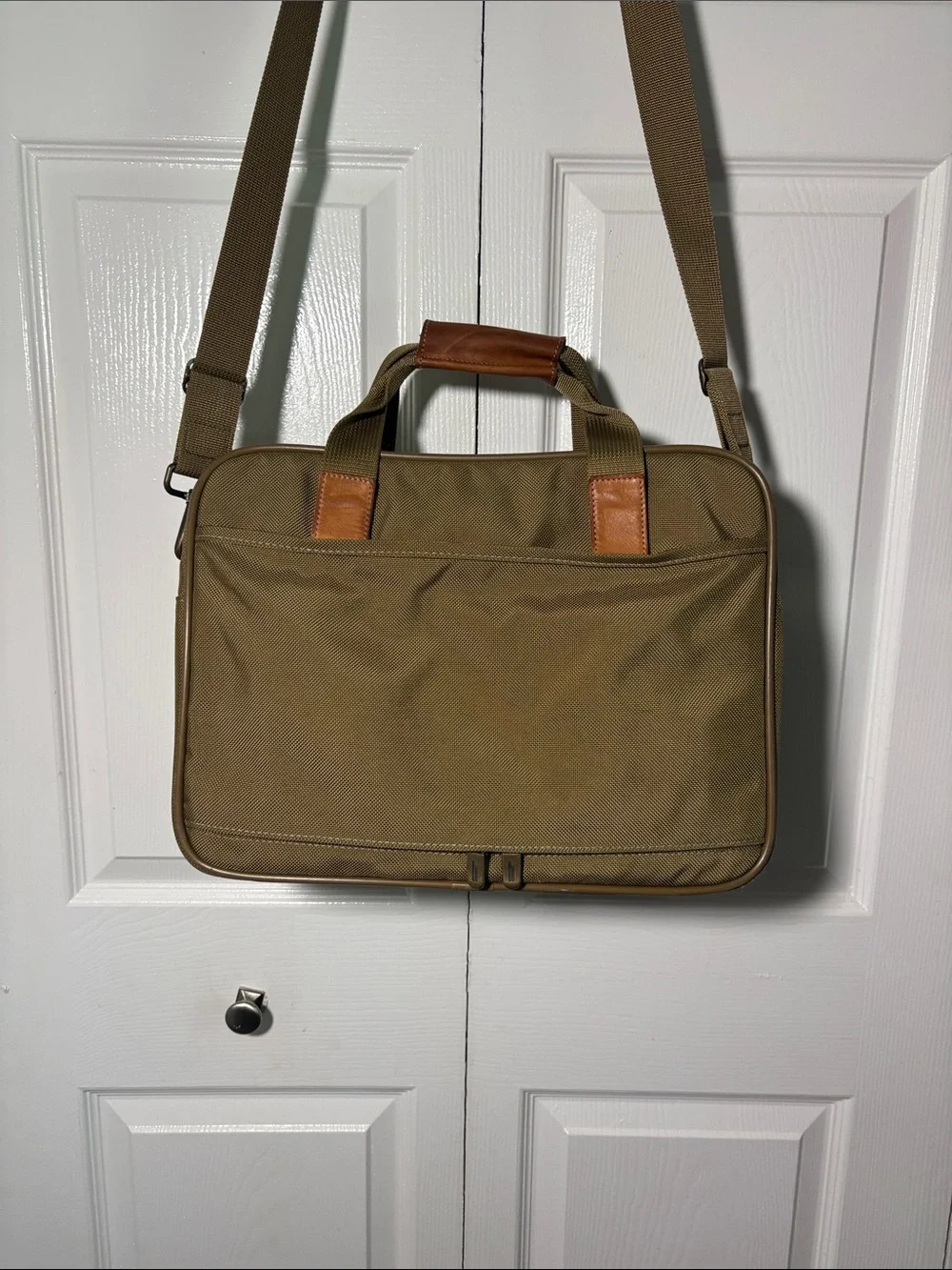 Hartmann nylon and leather  travel case with trolley sleeve.
